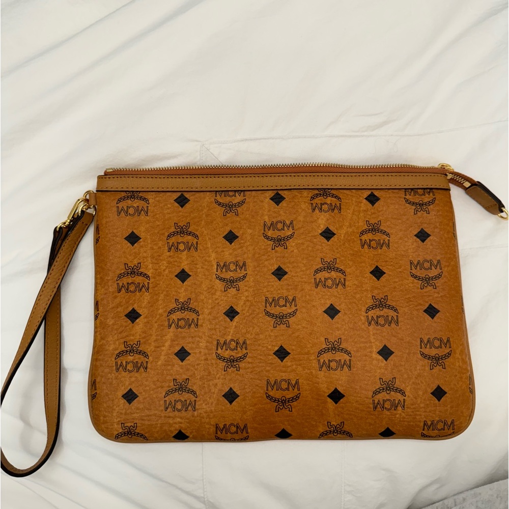 MCM womens medium pouch with strap